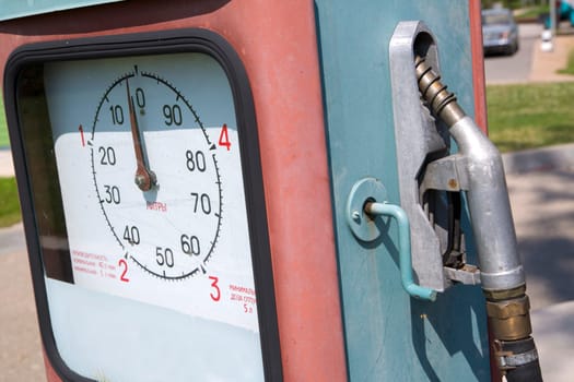 Old and dusty gas station in summer light