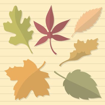 Autumn leaves on beige lined paper