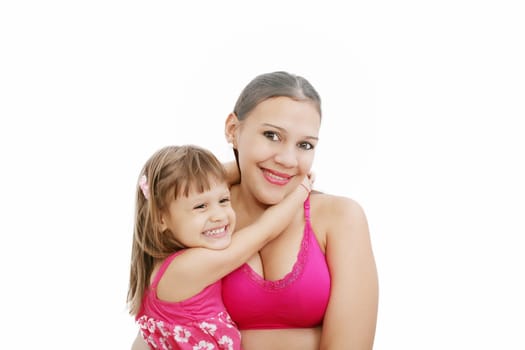 Portrait of Hispanic pregnant woman with daughter isolated over white background