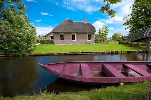 the idyllic Village of Giethoorn, also knows as Venice of the Netherlands, with its typical houses, bridges and canals