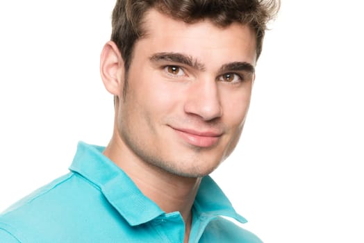 Portrait of a young man against a white studio background