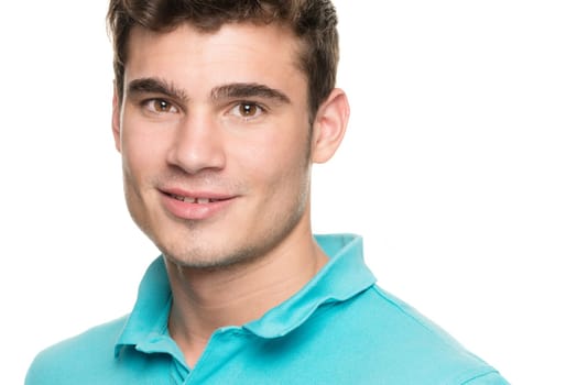 Portrait of a young man against a white studio background