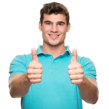 Portrait of a young man against a white studio background