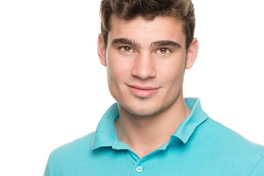 Portrait of a young man against a white studio background