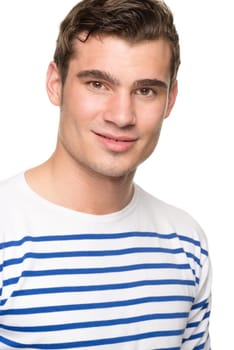 Portrait of a young man against a white studio background