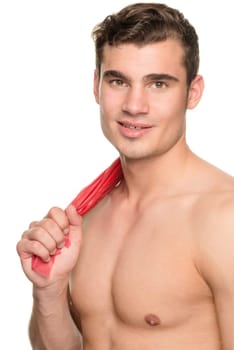 Young man with a red gymnastics band against a white studio background