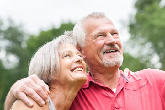 Happy senior couple in a park