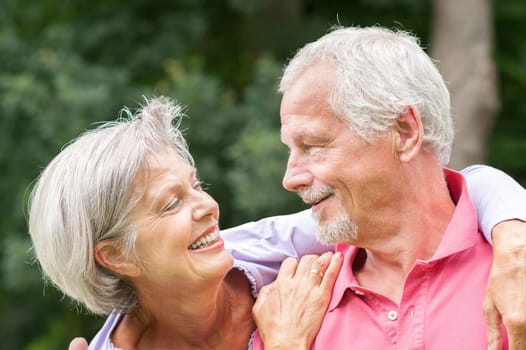 Happy senior couple in a park