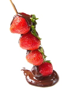 strawberries and chocolate on a white background