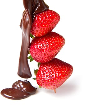 strawberries and chocolate on a white background