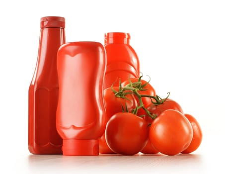 Composition with ketchup and fresh tomatoes isolated on white