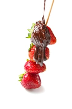 strawberries and chocolate on a white background