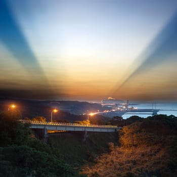 A road and windmills during sunset, made with a wide angle lens