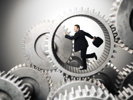businessman running inside of metal gear