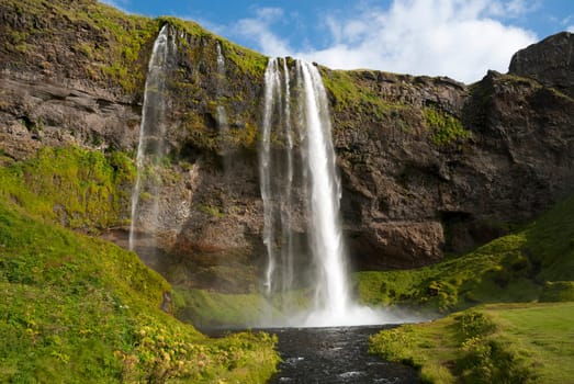 front view of the waterfall Seljalandsfoss in Iceland