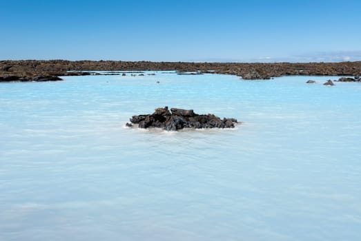 lake of boiling water over the blue lagoon in Iceland