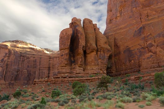 hand-shaped rock at sunset in Monument Valley in Utah in the United States of America