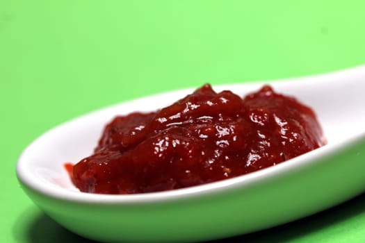 hot sauce on a spoon