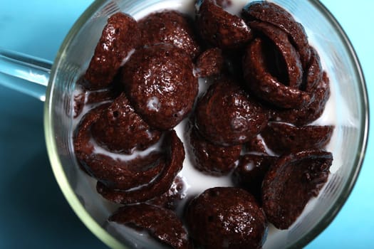 chocolate flakes with milk in glass