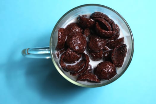 chocolate flakes with milk in glass