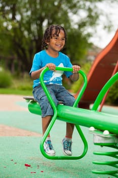 Outdoor portrait of a cute african american little boy