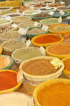 Various kinds of spices prepared to sell at a farmer&#039 s market.Vertically. (Provence, France)
