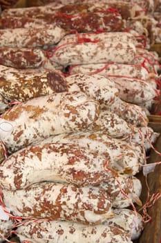 Sausages ready for sale on the market. (Arles, Provence, France). Vertically.