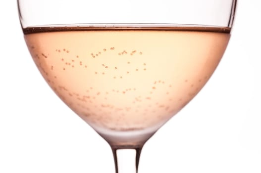 Close-up of rosé wine carbonated in wine glass