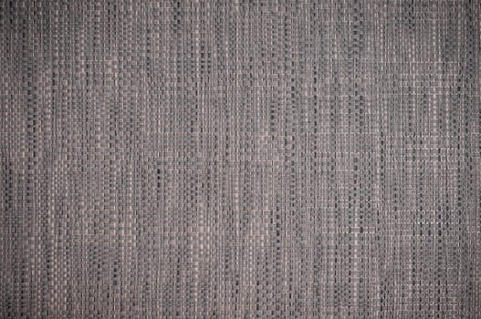 Grey and gold woven fabric with vignetting