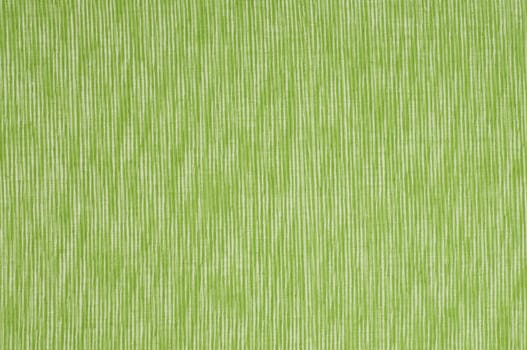 Green fabric background with stripes