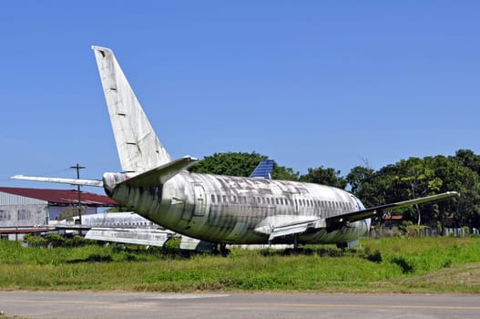 Old, abandoned passenger airplane.