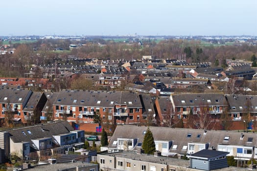 Suburb Vlaardingen, the Netherlands as seen from 10th floor of appartment building - View to Delft and the Hague in the background