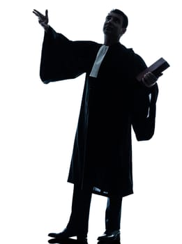 one caucasian lawyer man pleading silhouette in studio isolated on white background