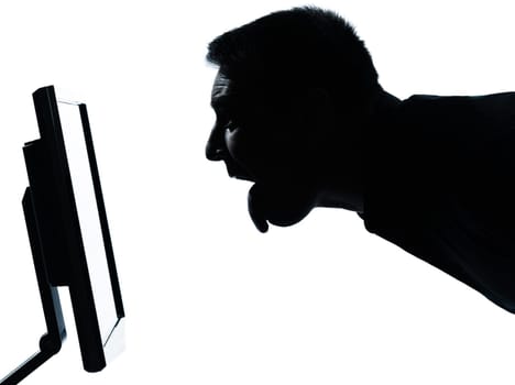 one caucasian business man face tongue out silhouette with computer screen display portrait in studio isolated on white background