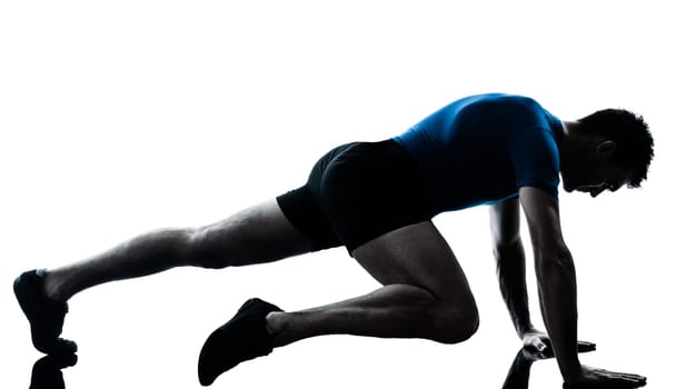 one caucasian man exercising workout fitness in silhouette studio  isolated on white background