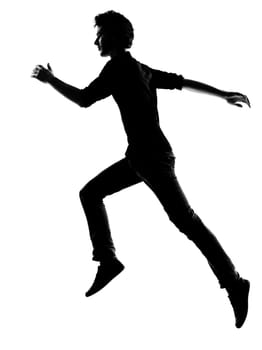 young man  running silhouette in studio isolated on white background