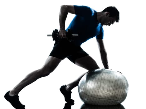 one caucasian man exercising weight training workout fitness in silhouette studio  isolated on white background