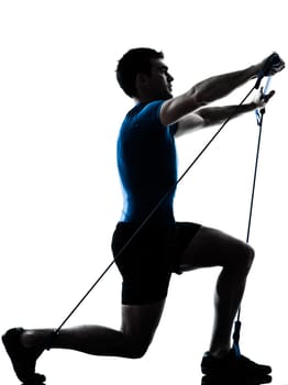 one caucasian man exercising workout fitness in silhouette studio  isolated on white background