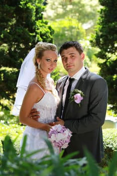 Classic portrait of wedding couple in the park
