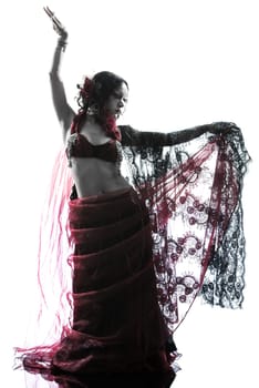 one arabic woman belly dancer dancing silhouette studio isolated on white background
