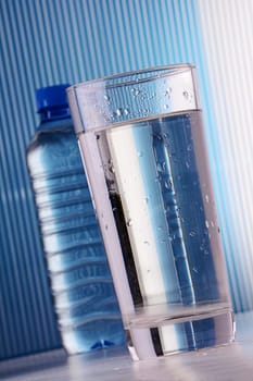 composition with gflass and bottle of water
