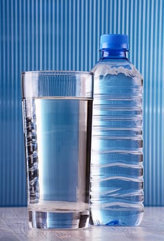 composition with gflass and bottle of water