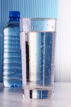 composition with gflass and bottle of water