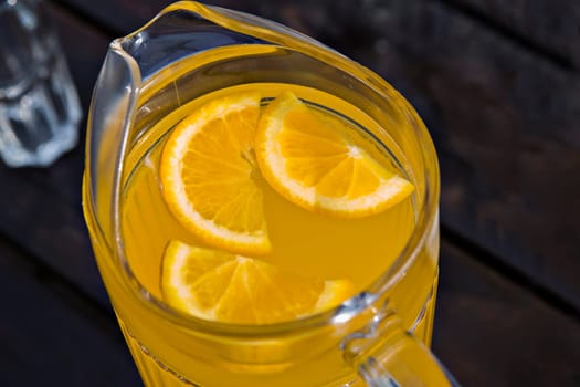 Zoomed juice of orange with pieces from fruit