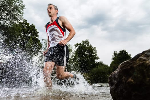 Trail running through a stream