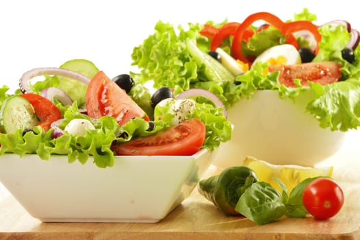 Vegetable salad bowl isolated on white
