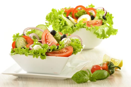 Vegetable salad bowl isolated on white