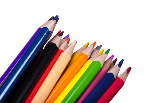 Colored crayons in a close-up against a white background