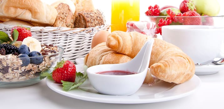 french breakfast with croissant and jam isolated on white background