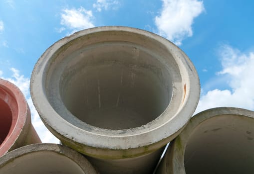piled up concrete drain pipes